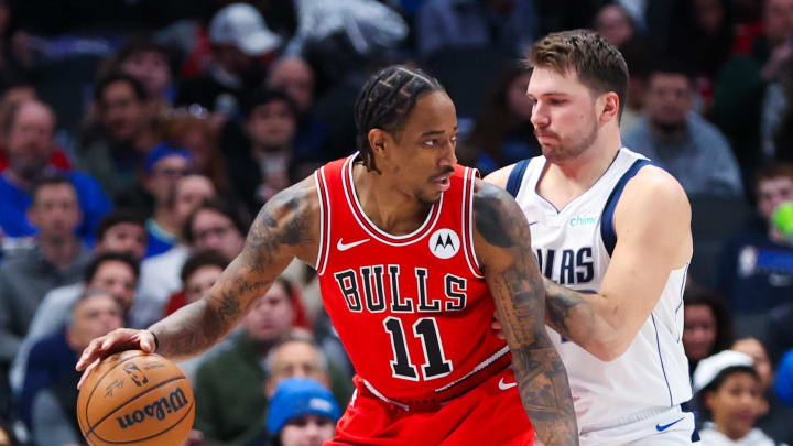 Nov 1, 2023; Dallas, Texas, USA;  Chicago Bulls forward DeMar DeRozan (11) looks to drive as Dallas Mavericks guard Luka Doncic (77) defends during the first quarter at American Airlines Center. Mandatory Credit: Kevin Jairaj-USA TODAY Sports