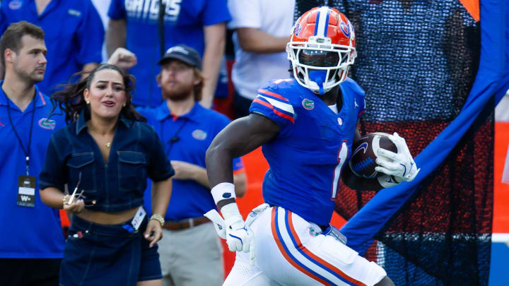 Florida Gators running back Montrell Johnson Jr. (1) breaks for a touchdown during the season opener at Ben Hill Griffin Stadium in Gainesville, FL on Saturday, August 31, 2024 against the University of Miami Hurricanes in the first half. Miami lead 24-10 at the half. [Doug Engle/Gainesville Sun]