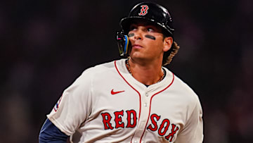 Apr 22, 2025; Boston, Massachusetts, USA; Boston Red Sox first base Triston Casas (36) hits a three-run home run against the Seattle Mariners in the seventh inning at Fenway Park.