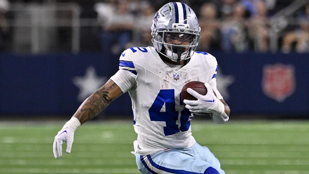 Dallas Cowboys running back Deuce Vaughn (42) runs with the ball during the game between the Dallas Cowboys and the Baltimore Ravens at AT&T Stadium.