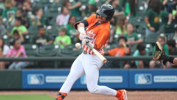 Hooks batter Jacob Melton fouls off a ball during Education Day at Whataburger Field, Wednesday, May 8, 2024, in Corpus Christi, Texas.