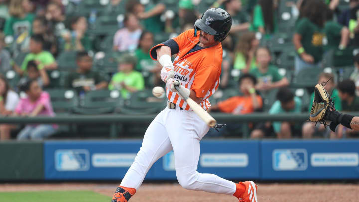Hooks batter Jacob Melton fouls off a ball during Education Day at Whataburger Field, Wednesday, May 8, 2024, in Corpus Christi, Texas.