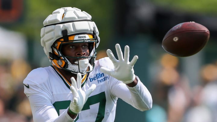 Green Bay Packers wide receiver Romeo Doubs catches a pass at training camp.