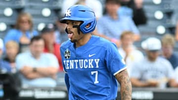 Jun 19, 2024; Omaha, NE, USA;  Kentucky Wildcats catcher Devin Burkes (7) reacts after striking out against the Florida Gators during the fourth inning at Charles Schwab Field Omaha. Mandatory Credit: Steven Branscombe-Imagn Images