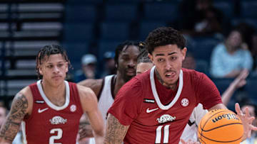 Arkansas Razorbacks forward Jalen Graham (11) leads the fast break against South Carolina during their second round game of the SEC Men's Basketball Tournament at Bridgestone Arena in Nashville, Tenn., Thursday, March 14, 2024.