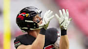 Arizona Cardinals tight end Trey McBride (85) warms up before their game against the San Francisco 49ers at State Farm Stadium on Glendale on Nov. 16, 2025.