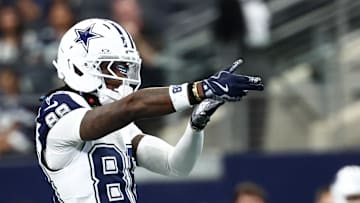 Dallas Cowboys wide receiver Ceedee Lamb (88) celebrates after a play against the Washington Commanders during the first quarter of the game at AT&T Stadium. 