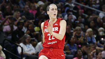 Aug 30, 2024; Chicago, Illinois, USA; Indiana Fever guard Caitlin Clark (22) celebrates after scoring against the Chicago Sky during the second half at Wintrust Arena. Mandatory Credit: Kamil Krzaczynski-Imagn Images