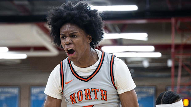 North's Amir Jenkins celebrates against Xaverian