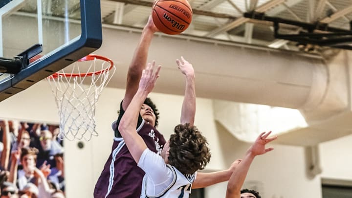 Nate Blenman gets a clean block St. Joseph's Collegiate last season, but now once a basketball hits the backboard on a clean shot attempt, if it is deflected by a defender, it is now goal-tending. Nate Blenman gets a clean block St. Joseph's Collegiate last season, but now once a basketball hits the backboard on a clean shot attempt, if it is deflected by a defender, it is now goal-tending.