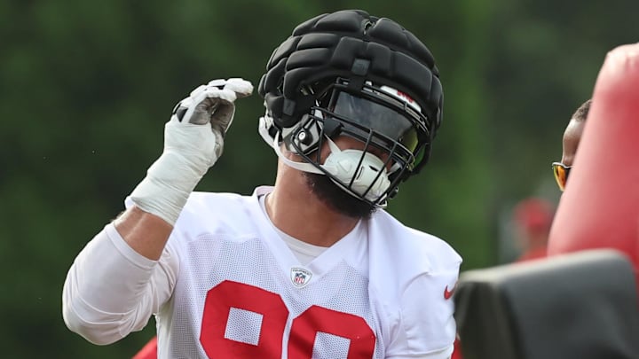 Jul 25, 2024; Tampa, FL, USA;  Tampa Bay Buccaneers defensive end Logan Hall (90) works out during training camp at AdventHealth Training Center. Mandatory Credit: Kim Klement Neitzel-Imagn Images