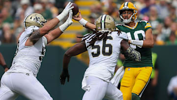 Green Bay Packers quarterback Jordan Love (10) passes the ball while under pressure against the New Orleans Saints in 2023.