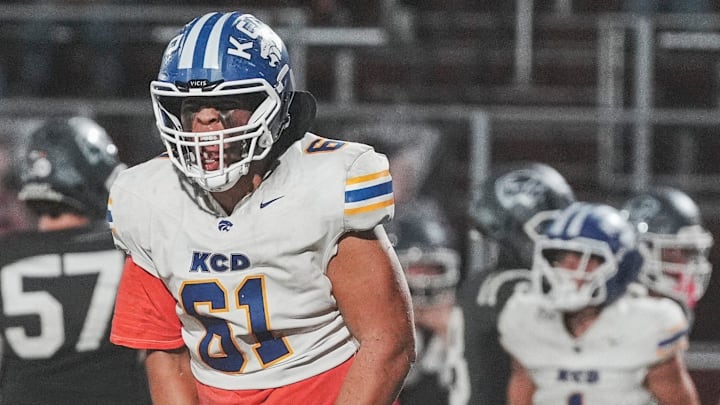 Kentucky Country Day's Kris Mandy celebrates a Bearcats sack in the second half as the Bearcats beat the Cougars 33-19 during Friday night football at Holy Cross High School on Oct. 11, 2024