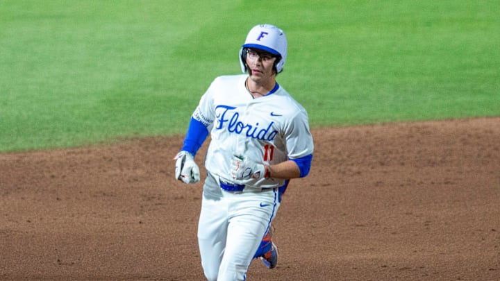Florida infielder Brendan Lawson (11) hits his ninth homer of the season in the bottom of the sixth against FSU, March 10, 2026, at Condron Family Ballpark in Gainesville, Florida.The Gators beat the Seminoles 6-3. [Cyndi Chambers/ Gainesville Sun] 2026