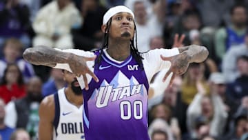 Nov 14, 2024; Salt Lake City, Utah, USA; Utah Jazz guard Jordan Clarkson (00) reacts to making a three point shot against the Dallas Mavericks during the third quarter at Delta Center. Mandatory Credit: Rob Gray-Imagn Images