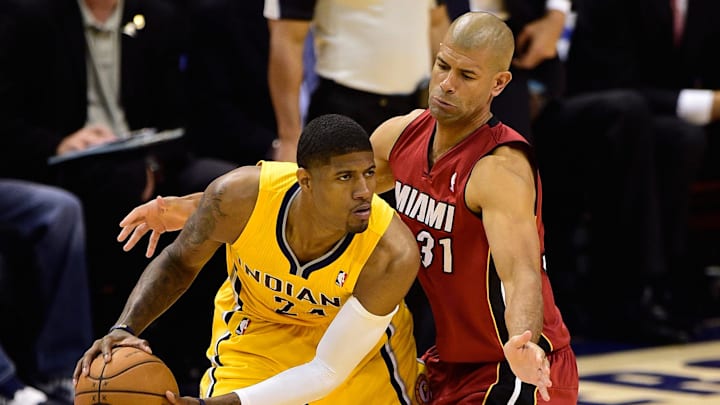 May 18, 2014; Indianapolis, IN, USA; Indiana Pacers forward Paul George (24) looks to pass the ball around Miami Heat forward Shane Battier (31) during the second half of game one of the Eastern Conference Finals of the 2014 NBA Playoffs at Bankers Life Fieldhouse. Indiana Pacers beat Miami Heat 107 to 96.  Mandatory Credit: Marc Lebryk-Imagn Images