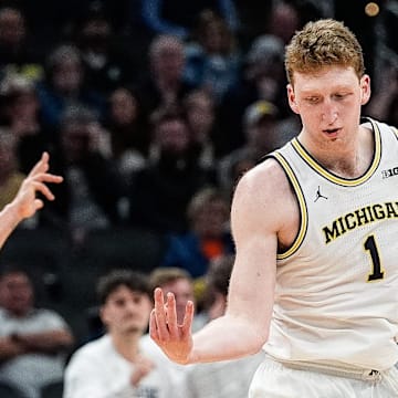 Michigan center Danny Wolf celebrates a 3-point basket against Purdue during the second half of a Big Ten Tournament quarterfinal at Gainbridge Fieldhouse in Indianapolis on Friday, March 14, 2025.