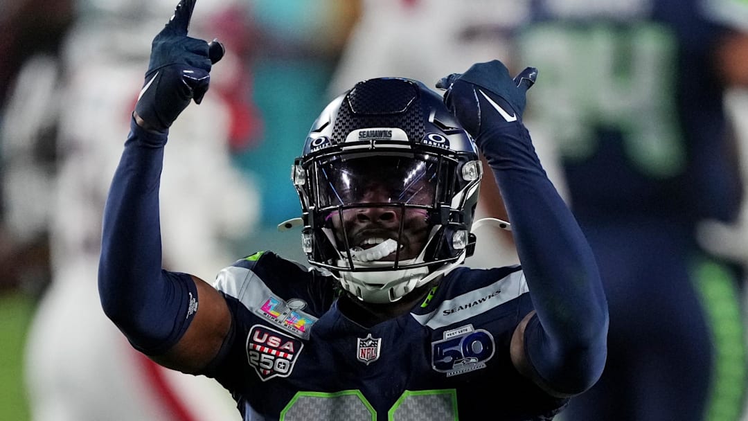 Seattle Seahawks cornerback Devon Witherspoon celebrates