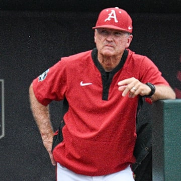 Arkansas Razorbacks head coach Dave Van Horn watches action against the LSU Tigers during the first inning at Charles Schwab Field.