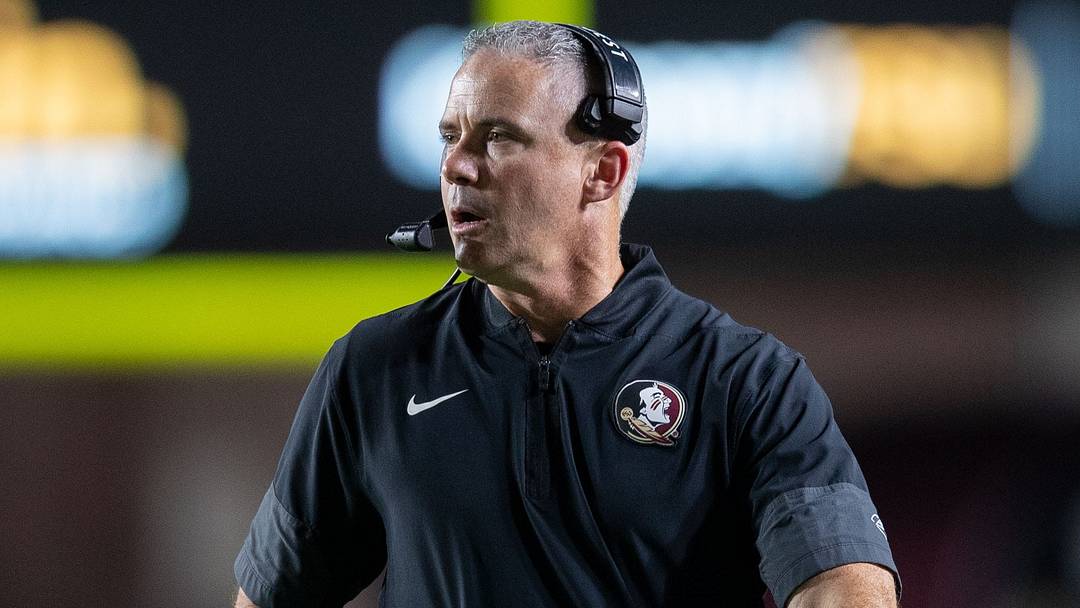 Florida State Seminoles head coach Mike Norvell talks into his headset during a timeout. The Florida State Seminoles defeated the New Mexico State Aggies 34-17 at Doak Campbell Stadium on Saturday, Aug. 29, 2026. Florida State Seminoles head coach Mike Norvell talks into his headset during a timeout. The Florida State Seminoles defeated the New Mexico State Aggies 34-17 at Doak Campbell Stadium on Saturday, Aug. 29, 2026.