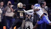 Vanderbilt wide receiver Tre Richardson (6) runs in for touchdown after making catch Kentucky defensive back during the first half at FirstBank Stadium in Nashville, Tenn., Saturday, Nov. 22, 2025.