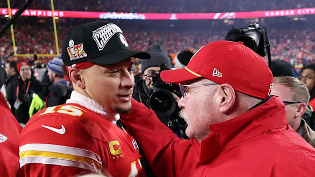 Chiefs quarterback Patrick Mahomes and Andy Reid embrace after winning the AFC Championship game against the Bills.