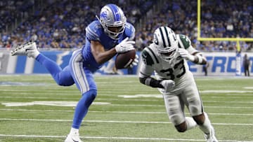 Sep 10, 2018; Detroit, MI, USA; Detroit Lions wide receiver T.J. Jones (13) unable to make a catch as he is hit by New York Jets defensive back Jamal Adams (33) during the fourth quarter at Ford Field. Mandatory Credit: Raj Mehta-Imagn Images