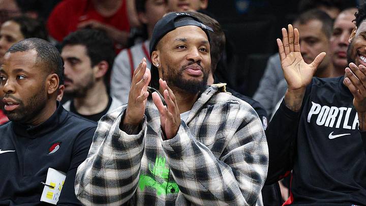 Mar 16, 2026; Brooklyn, New York, USA;  Portland Trail Blazers guard Damian Lillard (center) celebrates with  teammates during the second half against the Brooklyn Nets at Barclays Center. Mandatory Credit: Vincent Carchietta-Imagn Images