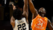 Jan 18, 2025; Nashville, Tennessee, USA;  Tennessee Volunteers forward Felix Okpara (34) blocks the shot of Vanderbilt Commodores forward Jaylen Carey (22) during the second half at Memorial Gymnasium