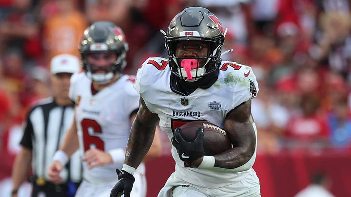 Sep 8, 2024; Tampa, Florida, USA;  Tampa Bay Buccaneers running back Bucky Irving (7) runs with the ball against the Washington Commanders during the second half at Raymond James Stadium. Mandatory Credit: Kim Klement Neitzel-Imagn Images