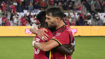 Aug 9, 2024; St. Louis, Missouri, USA; St. Louis CITY SC defender Josh Yaro (15) and St. Louis CITY SC midfielder Eduard Loewen (10) celebrate their 3-1 victory over the Portland Timbers at CITYPARK. Mandatory Credit: Joe Puetz-USA TODAY Sports