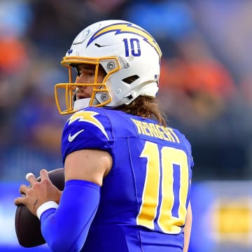 Dec 10, 2023; Inglewood, California, USA; Los Angeles Chargers quarterback Justin Herbert (10) drops back to pass against the Denver Broncos during the first half at SoFi Stadium. Mandatory Credit: Gary A. Vasquez-USA TODAY Sports