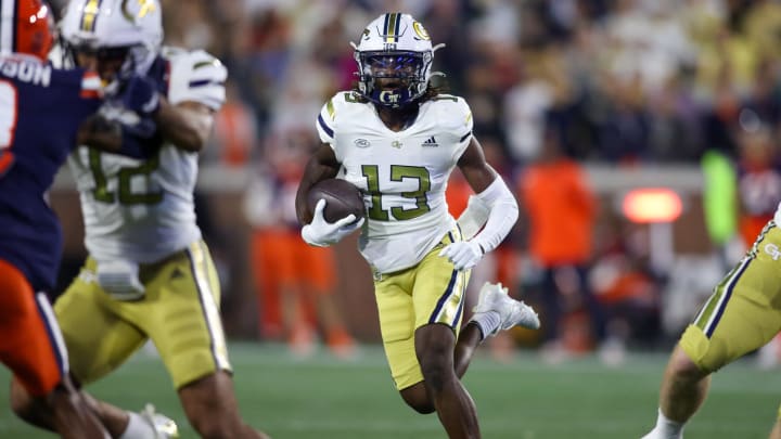 Nov 18, 2023; Atlanta, Georgia, USA; Georgia Tech Yellow Jackets wide receiver Eric Singleton Jr. (13) runs after a catch against the Syracuse Orange in the first half at Bobby Dodd Stadium at Hyundai Field. Mandatory Credit: Brett Davis-USA TODAY Sports