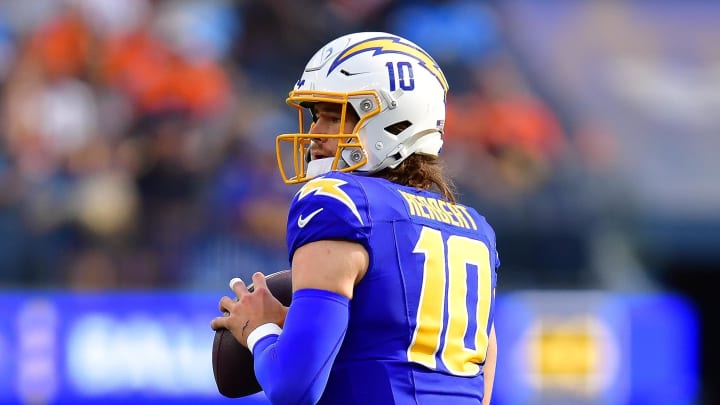 Dec 10, 2023; Inglewood, California, USA; Los Angeles Chargers quarterback Justin Herbert (10) drops back to pass against the Denver Broncos during the first half at SoFi Stadium. Mandatory Credit: Gary A. Vasquez-USA TODAY Sports