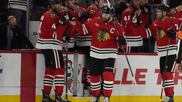 Nov 6, 2024; Chicago, Illinois, USA;Chicago Blackhawks left wing Nick Foligno (17) celebrates his goal against the Detroit Red Wings during the second period at United Center. Mandatory Credit: David Banks-Imagn Images