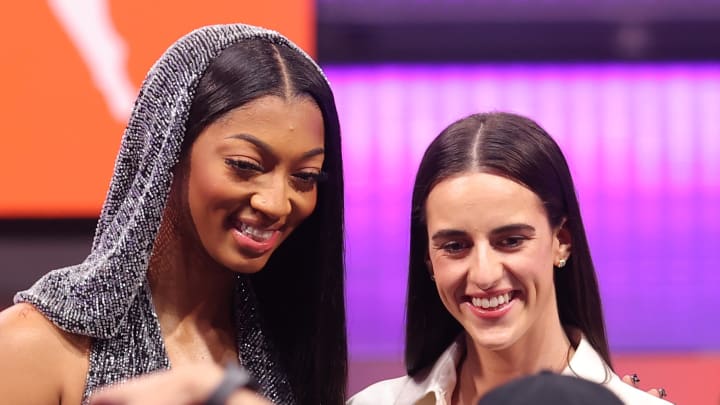 Angel Reese and Caitlin Clark pose for photos before the 2024 WNBA Draft at Brooklyn Academy of Music.