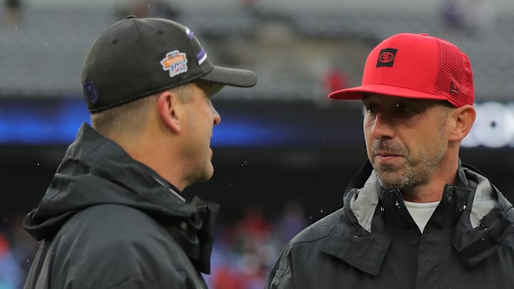 San Francisco 49ers head coach Kyle Shanahan (R) and Baltimore Ravens head coach John Harbaugh (L)