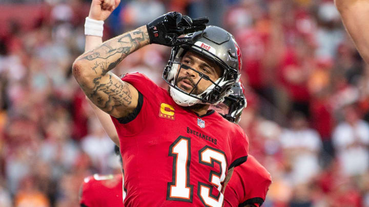 Dec 24, 2023; Tampa, Florida, USA; Tampa Bay Buccaneers wide receiver Mike Evans (13) celebrates the touchdown against the Jacksonville Jaguars in the second quarter at Raymond James Stadium. Mandatory Credit: Jeremy Reper-USA TODAY Sports