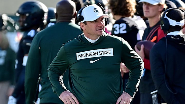 Nov 2, 2024; East Lansing, Michigan, USA;  Michigan State Spartans head coach Jonathan Smith looks over his sidelines during the first quarter against the Indiana Hoosiers at Spartan Stadium. Mandatory Credit: Dale Young-Imagn Images
