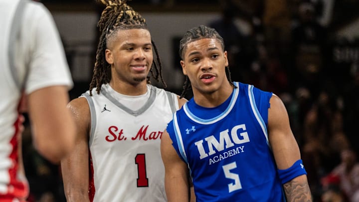 Orchard Lake St. Mary’s Trey McKenney (1) share a few words with IMG Academy’s Darius Acuff Jr. (5) during a game at the O'rena in Rochester on Thursday, Jan. 9, 2025. The two are long-time friends.
