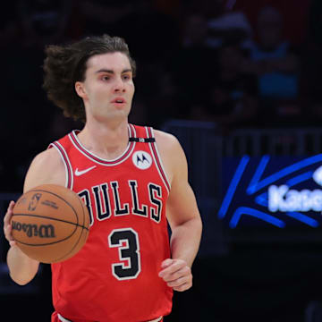 Mar 8, 2025; Miami, Florida, USA; Chicago Bulls guard Josh Giddey (3) dribbles the basketball against the Miami Heat during the first quarter at Kaseya Center. Mandatory Credit: Sam Navarro-Imagn Images