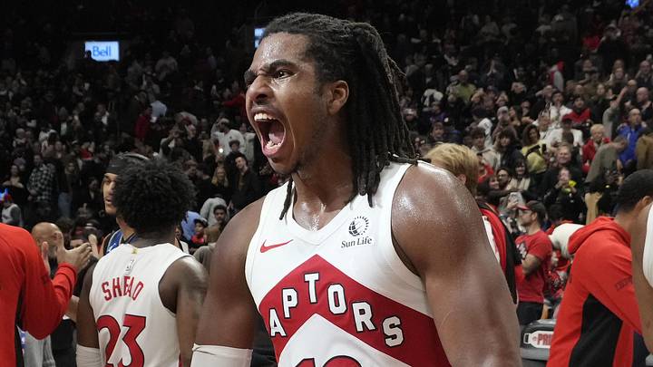 Dec 29, 2025; Toronto, Ontario, CAN; Toronto Raptors forward Collin Murray-Boyles (12) reacts after a win over the Orlando Magic at Scotiabank Arena. Mandatory Credit: John E. Sokolowski-Imagn Images