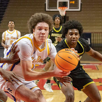 St. Rose’s Jayden Hodge drives to the basket. St. Rose Boys Basketball loses to Roselle Catholic 55-51 in Non-Public B boys basketball state championship in Piscataway on March 14, 2025.