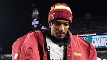 Jan 26, 2025; Philadelphia, PA, USA; Washington Commanders quarterback Jayden Daniels (5) walks off the field after losing the NFC Championship game against the Philadelphia Eagles at Lincoln Financial Field. Mandatory Credit: Eric Hartline-Imagn Images