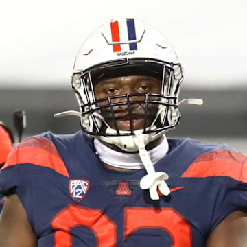 Dec 11, 2020; Tucson, Arizona, USA; Arizona Wildcats defensive tackle Kyon Barrs (92) against the Arizona State Sun Devils during the Territorial Cup at Arizona Stadium. Mandatory Credit: Mark J. Rebilas-Imagn Images