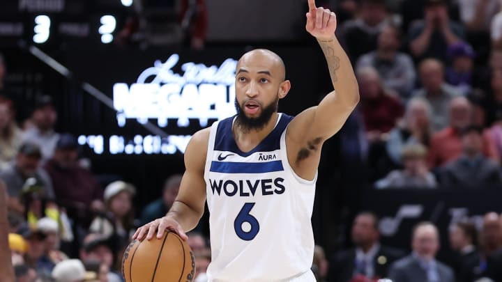 Mar 18, 2024; Salt Lake City, Utah, USA; Minnesota Timberwolves guard Jordan McLaughlin (6) calls a play against the Utah Jazz during the third quarter at Delta Center. Mandatory Credit: Rob Gray-USA TODAY Sports