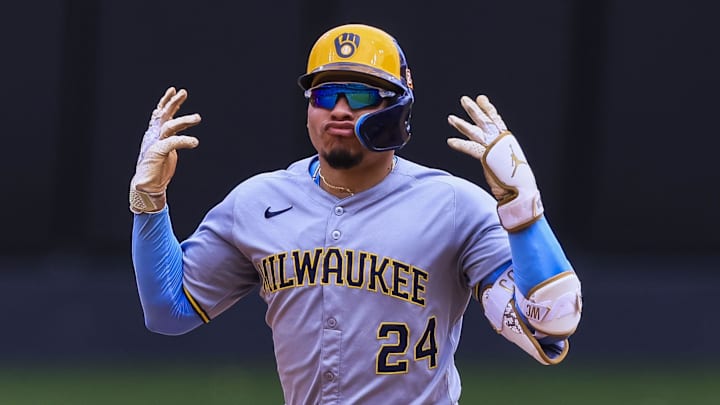 Milwaukee Brewers designated hitter William Contreras (24) celebrates a two-run home run against the Cincinnati Reds at Great American Ball Park. 