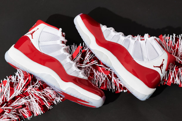 White and red Air Jordan 11 sneakers.