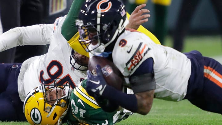 Bears safety Jaquan Brisker recovers Jordan Love's fumble after a hit in lsat year's 17-9 regular-season finale won by the Packers.