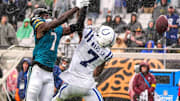 Jacksonville Jaguars wide receiver Brian Thomas Jr. (7) can’t hold onto a pass intended for him in the third quarter as Indianapolis Colts cornerback Charvarius Ward (7) defends him during an NFL football game at EverBank Stadium, Sunday, Dec. 7, 2025, in Jacksonville, Fla. Jaguars won 36-19[Doug Engle/Florida Times-Union]